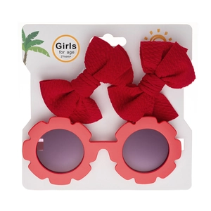 Coffret lunettes de soleil fleur et barrettes nœuds rouges pour enfants