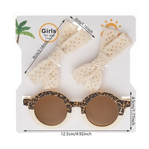 Set d'accessoires enfant avec lunettes léopard et deux barrettes à nœuds en dentelle