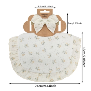 Floral cotton gauze baby bib and headband set with ruffle trim on heart-shaped display card