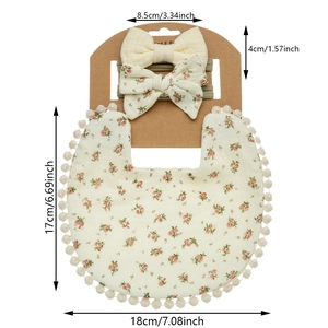 Detailed size chart for floral baby bib and matching bow headbands set on kraft paper