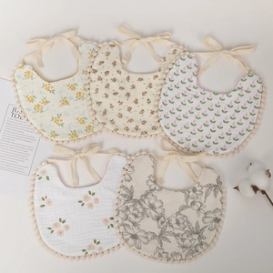 Five-pack of floral cotton baby bibs with lace trim and adjustable ties for newborns