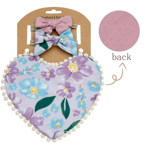 Detail of floral baby bib and headbands set with textured fabric backing view