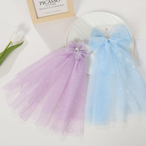 Detailed view of lavender flower and blue snowflake chiffon veil hair clips for girls