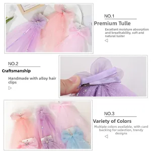 Detail of multi-color chiffon hair bows with fully wrapped alloy clips and soft tulle veil