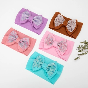 Detailed set of 5 waffle texture baby headbands with colorful floral print bows