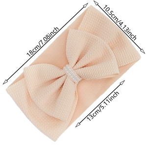 Waffle texture infant headband with pearl bow detail in beige, 18cm flat length