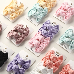 Set of lace hollow bow hair clips for kids in macaron colors on display cards