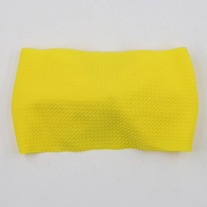 Detail of bright yellow waffle texture elastic headband for infants and kids