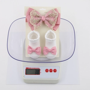 Coffret cadeau Noël pour nouveau-né avec bandeau en dentelle et chaussettes