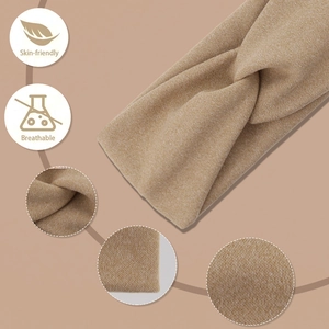 Close-up of skin-friendly and breathable soft camel knitted twist headband texture
