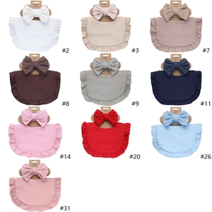 Muslin cotton baby headband and bib set with ruffled edges in ten various colors