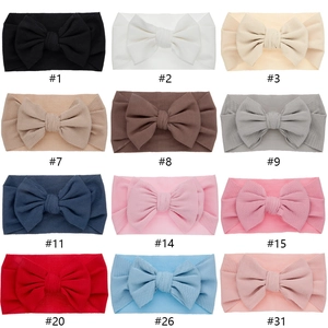 Elastic ribbed knit baby headbands with large bows in 12 assorted vibrant colors