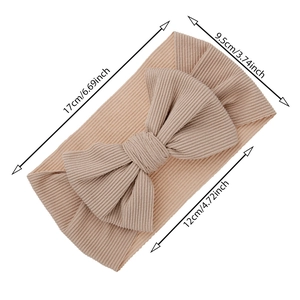 Elastic ribbed knit baby headband with large bow in beige, size 17x9.5cm for infants
