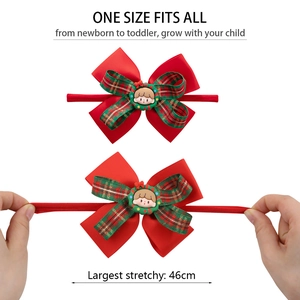 Détail du bandeau de Noël en nylon élastique s'étirant à 46 cm avec un gros nœud rouge