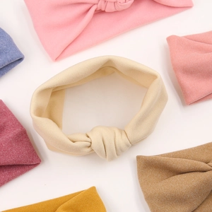 Soft textured knot headbands for infants and girls in various pastel colors and stylish design