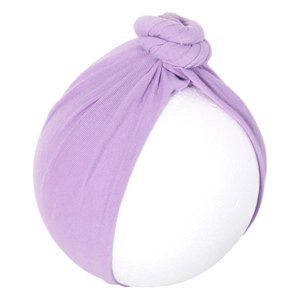 Close-up of light purple ribbed knit baby turban hat with a 3D donut knot decoration
