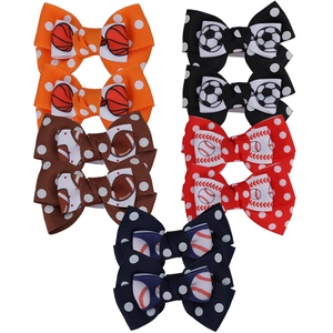 Set of 10 sports-themed bow hair clips featuring basketball, soccer, and rugby prints