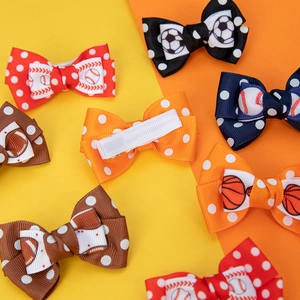 Handmade sports themed bow hair clips with football baseball patterns and polka dots