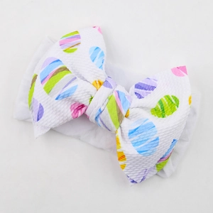 Zachte nylon baby hoofdband met grote kleurrijke strik en wafelstructuur weefsel