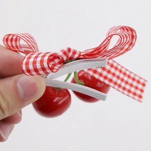 Cute red cherry hair clip with red and white gingham bow for girls and babies