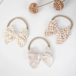 3-pack elastic nylon baby headbands with embroidered bows in polka dot and stripe patterns