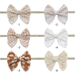 Set of six baby bow headbands with floral embroidery and stripes on elastic nylon bands