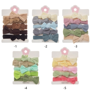 Five-set of ribbed bow headbands for babies in assorted Morandi colors and textures