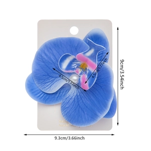 Blue orchid flower hair clip with pearl center, dimensions 9.3x9cm for beach vacation