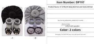 Detailed view of baby knot hat and doll socks gift set in cotton for infants 0-12 months