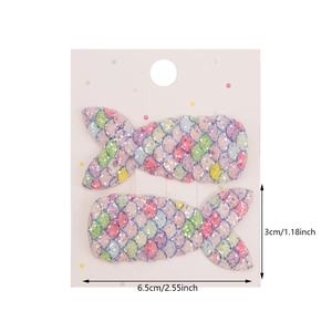 Sparkly mermaid tail hair clips for girls featuring colorful sequins and gradient design