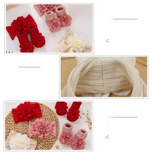 Detail of baby floral headband and knit socks set featuring delicate lace petals