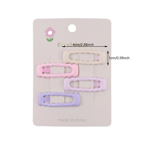 Set of four colorful star wavy hair clips in pink and purple with glossy finish