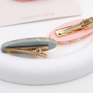 Elegante Haarspangen aus Acetat mit Goldfolien-Inlay und stabilen Entenschnabel-Clips