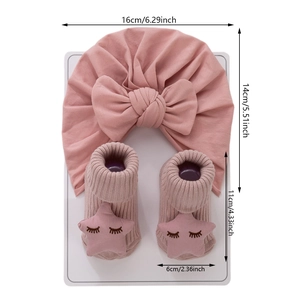 Ensemble turban rose pour bébé avec grand nœud et chaussettes à motif étoile