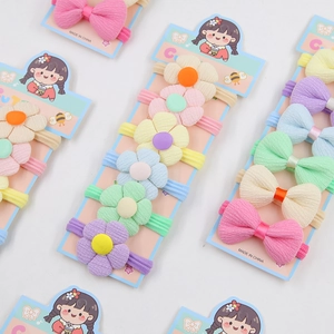 Élastiques à cheveux fleurs pour enfants couleurs bonbon sur carte décorative