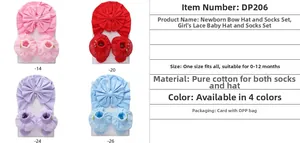 Detail of cotton newborn bow hat and lace socks set in four soft pastel colors