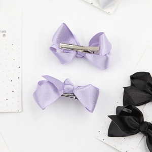 Set of satin bow hair clips in purple and black colors for girls with metal duckbill base