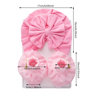 Pink newborn cotton turban hat and lace socks set with dimensions 17x16cm and 10cm height