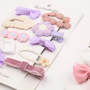 Détail de 10 pinces à cheveux pour filles avec fleurs en tricot et nœuds en ruban