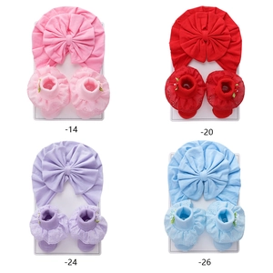 Newborn baby cotton turban headband and lace trim socks set with large bow detail
