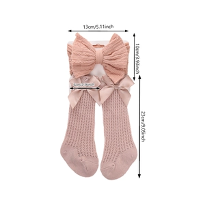 Pink infant headband and mesh knee high socks set with decorative ribbon bows