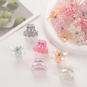 36-piece colorful mini claw clips for girls in a pink storage jar with mixed pastel colors