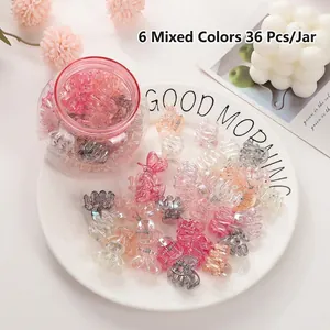 36-piece set of colorful mini plastic hair clips for girls in a clear storage jar