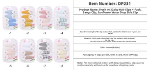 Détail des barrettes à fleurs de 6 cm en coton fait main avec spécifications du matériau