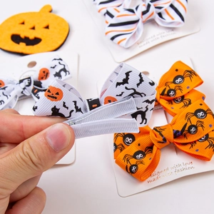 Lot de 2 barrettes à nœuds pour Halloween avec motifs citrouille et araignée pour enfants