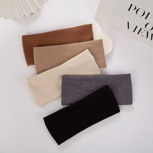 Set of five elastic wide headbands in neutral tones with soft knit texture for daily hair styling