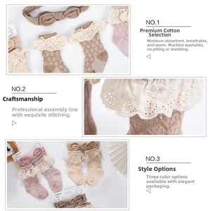 Detail of baby cotton waffle socks and lace headbands in pink, beige and khaki colors