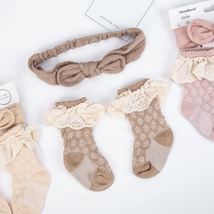 Infant cotton lace socks and bow headband set in earthy tones with waffle texture