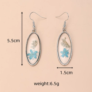 Boucles d'oreilles ovales en résine avec fleurs séchées, longueur 5,5cm, poids 6,5g