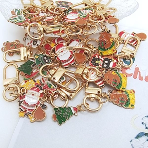 Cute Christmas cartoon alloy keychains with Santa Claus and cats for holiday decoration